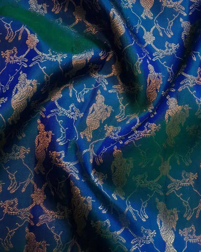 Blue fabric with gold animal patterns